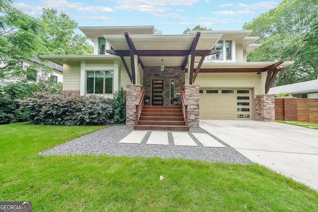 1267 Thomas Rd, Decatur, GA 30030 - view of front of property with an attached garage, concrete driveway, and stone siding