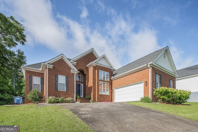 158 Sugarloaf Cir, Macon, GA 31204 - traditional home featuring brick siding, driveway, a front yard, and a garage