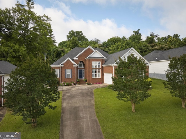 158 Sugarloaf Cir, Macon, GA 31204 - view of front of property featuring brick siding, a garage, concrete driveway, and a front lawn
