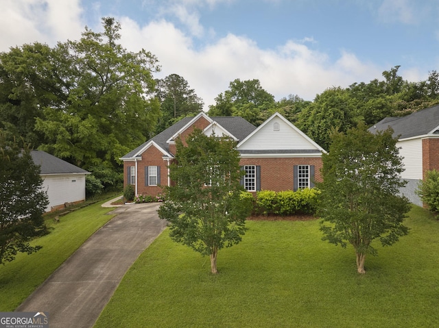 158 Sugarloaf Cir, Macon, GA 31204 - traditional-style home with brick siding, a front lawn, and concrete driveway