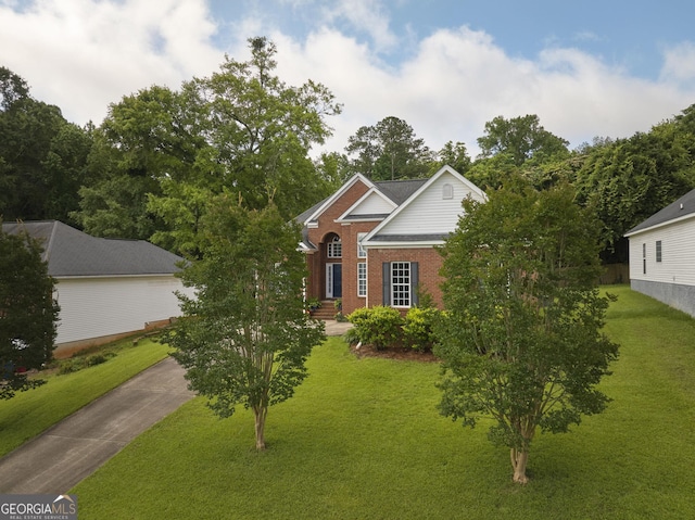 158 Sugarloaf Cir, Macon, GA 31204 - view of front of property with a front yard and brick siding