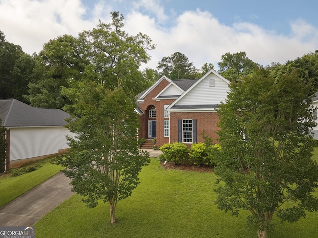 158 Sugarloaf Cir, Macon, GA 31204 - view of front of home with a front lawn and brick siding