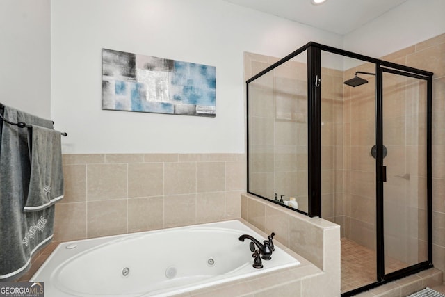 190 Marion Pl NE, Atlanta, GA 30307 - bathroom featuring a stall shower and a tub with jets