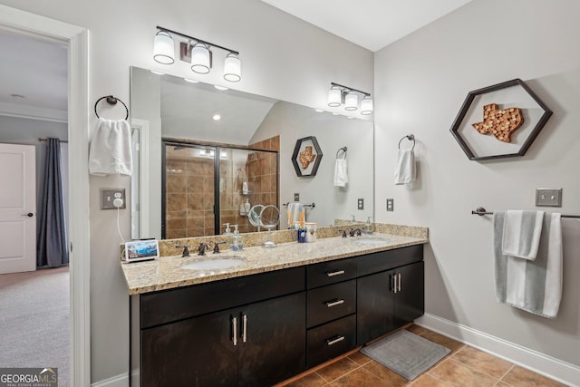 190 Marion Pl NE, Atlanta, GA 30307 - full bathroom with double vanity, a stall shower, baseboards, and tile patterned flooring