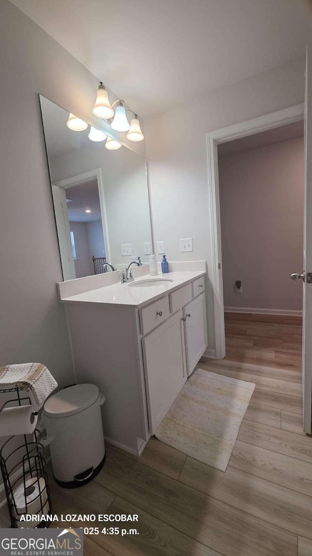 2757 Malton Way, Loganville, GA 30052 - bathroom featuring wood finished floors and vanity