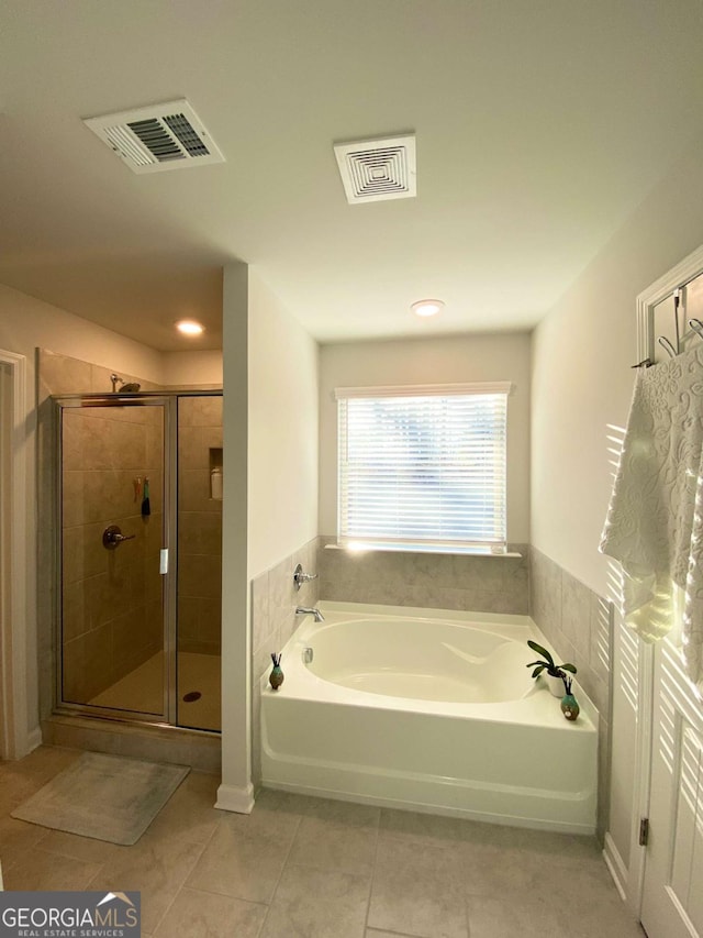 2757 Malton Way, Loganville, GA 30052 - full bathroom with a bath, tile patterned flooring, a stall shower, and recessed lighting