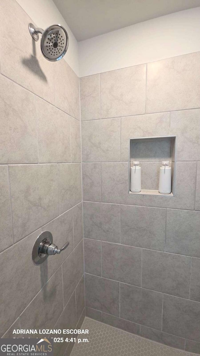 2757 Malton Way, Loganville, GA 30052 - bathroom featuring a tile shower