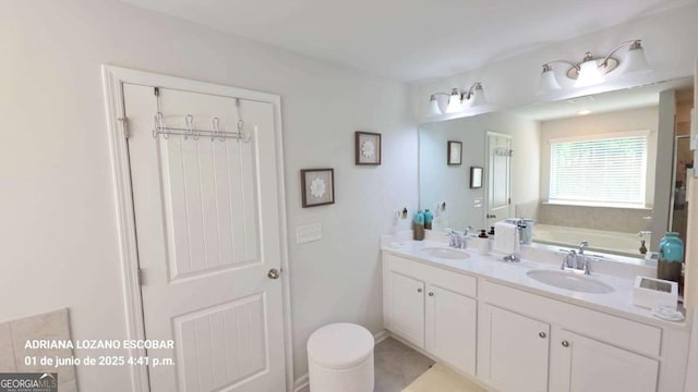 2757 Malton Way, Loganville, GA 30052 - full bath with double vanity and a bath