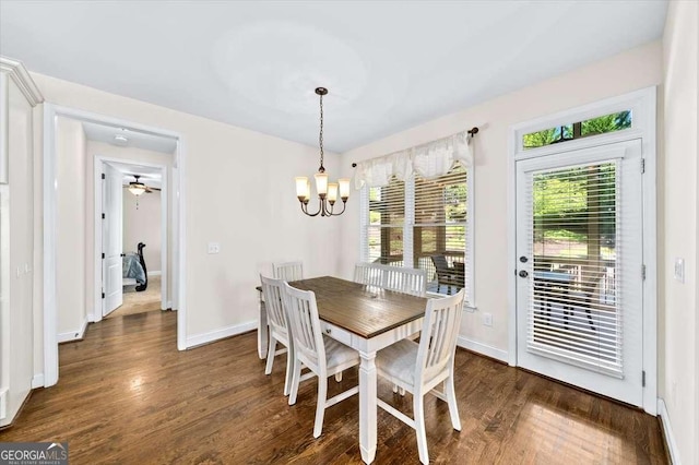 622 Rocky Creek Pt, Woodstock, GA 30188 - dining room featuring dark wood-style floors, a chandelier, and baseboards