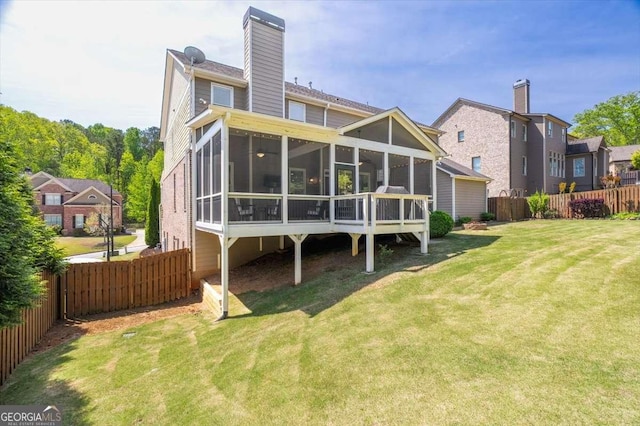 622 Rocky Creek Pt, Woodstock, GA 30188 - back of property with a sunroom and a chimney