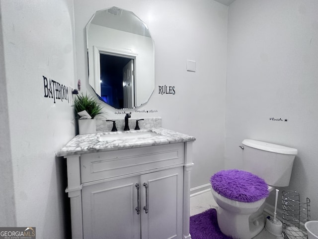 170 Graystone Cir, Macon, GA 31211 - half bath with marble finish floors, toilet, vanity, and baseboards