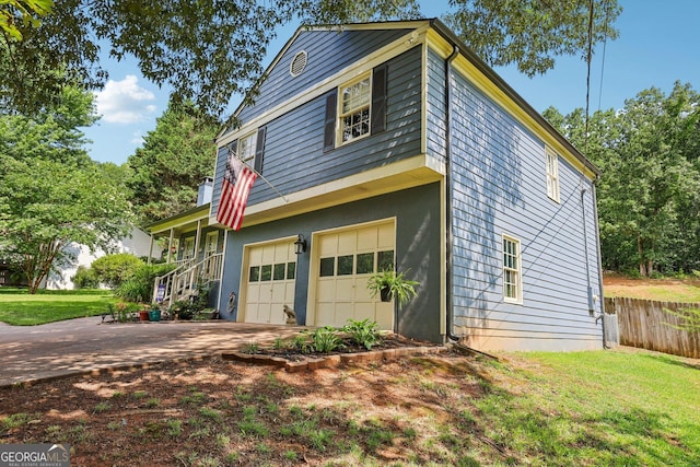 9725 Kings Rd, Gainesville, GA 30506 - view of side of home with a garage, concrete driveway, and stairway
