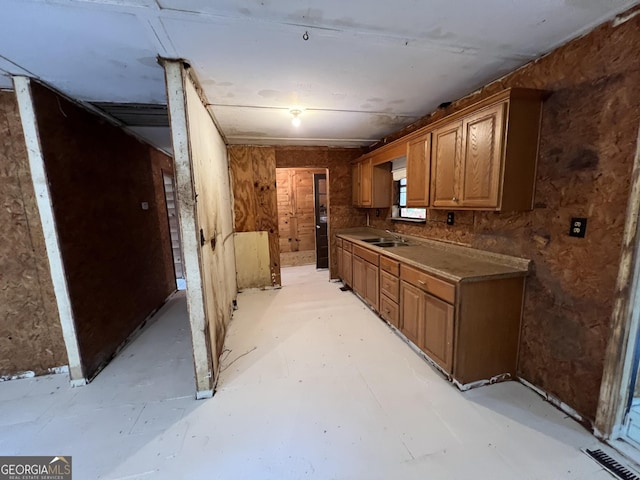 60 Coltrane Rd, Dawsonville, GA 30534 - kitchen with brown cabinetry and a sink