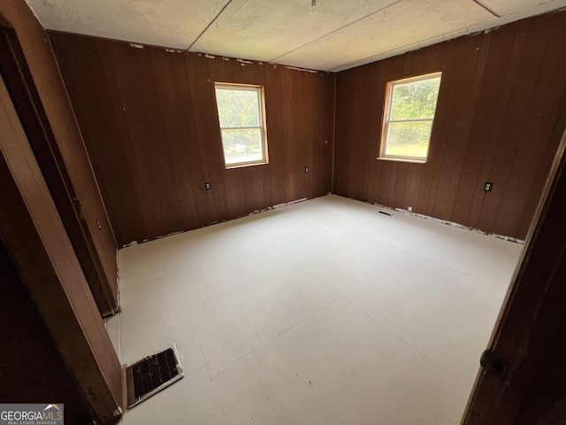 60 Coltrane Rd, Dawsonville, GA 30534 - spare room with healthy amount of natural light and wooden walls