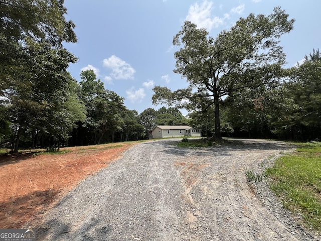 60 Coltrane Rd, Dawsonville, GA 30534 - view of front facade with a view of trees