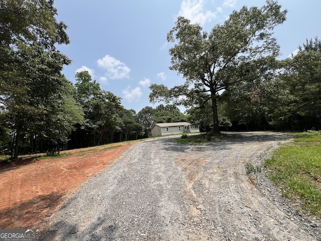 60 Coltrane Rd, Dawsonville, GA 30534 - view of front of property featuring driveway and a wooded view