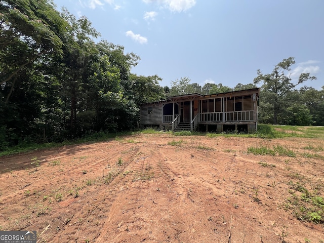 60 Coltrane Rd, Dawsonville, GA 30534 - view of yard featuring covered porch