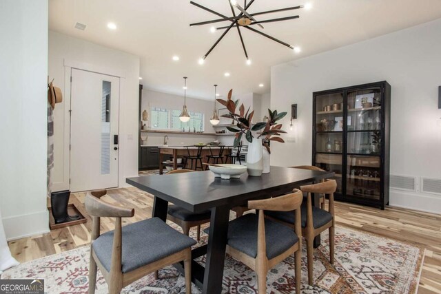 1168 Mado Loop, Chattahoochee Hills, GA 30268 - dining area with light wood-type flooring and recessed lighting