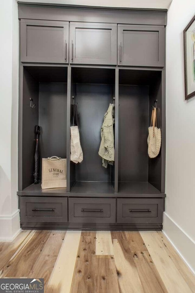 1168 Mado Loop, Chattahoochee Hills, GA 30268 - mudroom with baseboards and light wood finished floors