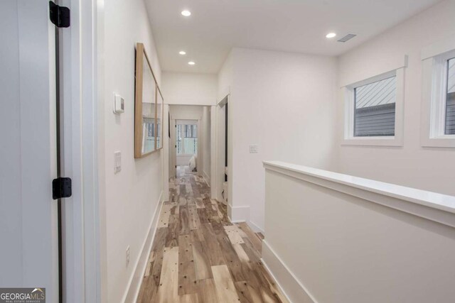 1168 Mado Loop, Chattahoochee Hills, GA 30268 - hall with light wood finished floors, recessed lighting, and baseboards