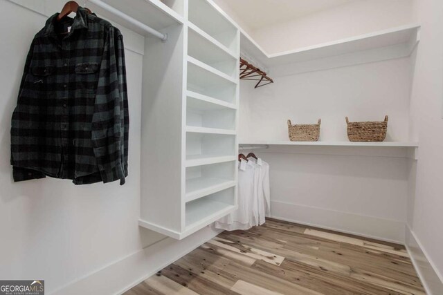 1168 Mado Loop, Chattahoochee Hills, GA 30268 - walk in closet featuring wood finished floors