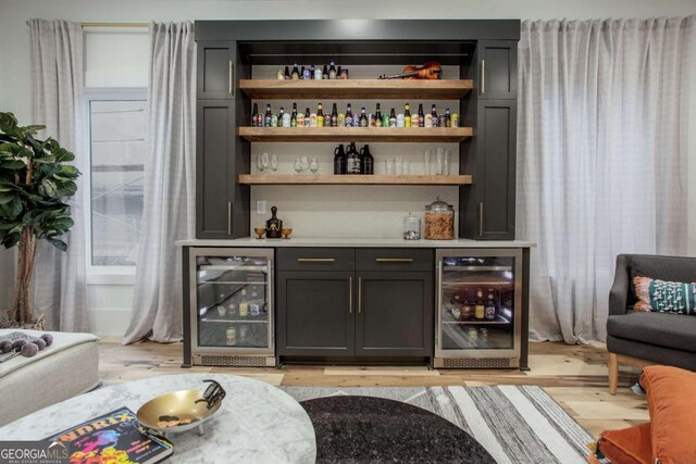 1168 Mado Loop, Chattahoochee Hills, GA 30268 - indoor bar featuring wine cooler and light wood-type flooring