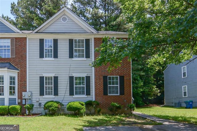 5920 Hampton Ct, College Park, GA 30349 - view of front of house featuring a front yard and brick siding