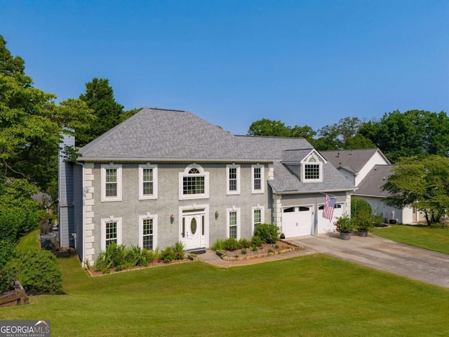 5223 Willow Ridge Dr, Woodstock, GA 30188 - view of front of house with concrete driveway, a front lawn, and roof with shingles