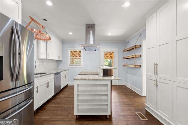 1686 Alvarado Ter SW, Atlanta, GA 30310 - kitchen featuring stainless steel appliances, island exhaust hood, white cabinetry, ornamental molding, and open shelves