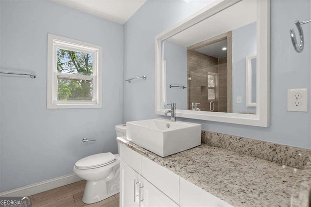 1686 Alvarado Ter SW, Atlanta, GA 30310 - full bath featuring vanity, tiled shower, and wood finished floors