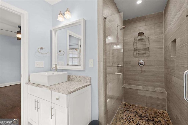 1686 Alvarado Ter SW, Atlanta, GA 30310 - full bathroom with a tile shower, vanity, and wood finished floors