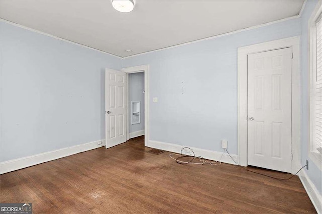 1686 Alvarado Ter SW, Atlanta, GA 30310 - unfurnished room featuring ornamental molding and wood finished floors