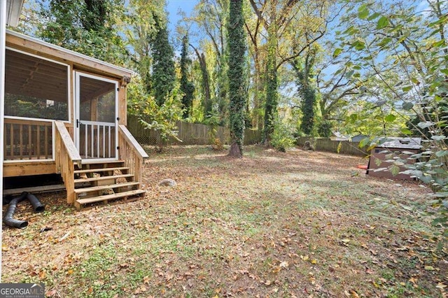 1686 Alvarado Ter SW, Atlanta, GA 30310 - fenced backyard with a sunroom