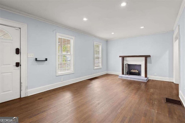 1686 Alvarado Ter SW, Atlanta, GA 30310 - unfurnished living room featuring wood finished floors, ornamental molding, recessed lighting, and a fireplace
