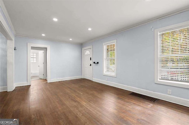 1686 Alvarado Ter SW, Atlanta, GA 30310 - foyer entrance with crown molding, wood finished floors, and recessed lighting