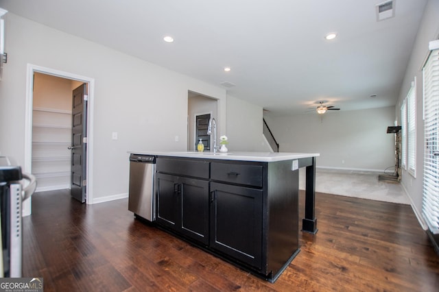 309 Dean Ct, Temple, GA 30179 - kitchen featuring dishwasher, dark wood-type flooring, ceiling fan, an island with sink, and light countertops