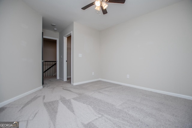 309 Dean Ct, Temple, GA 30179 - unfurnished room featuring carpet floors, ceiling fan, and baseboards