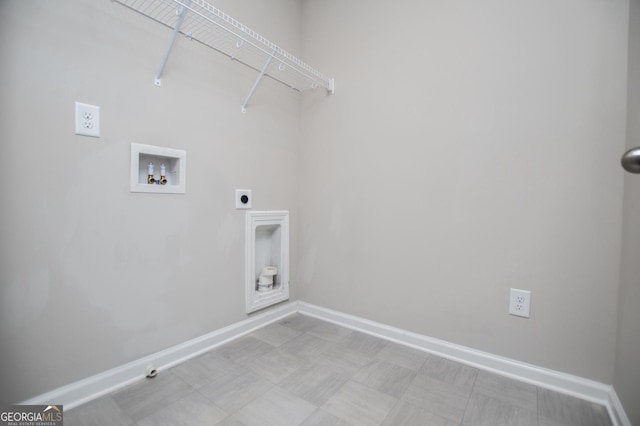 309 Dean Ct, Temple, GA 30179 - laundry room featuring hookup for an electric dryer, baseboards, washer hookup, gas dryer hookup, and light floors