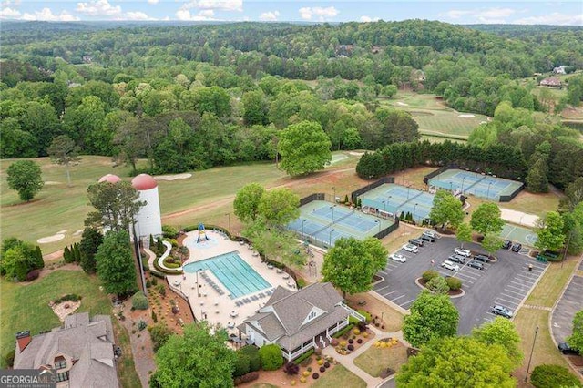 1039 Avery Creek Dr, Woodstock, GA 30188 - bird's eye view of a pool and a forest