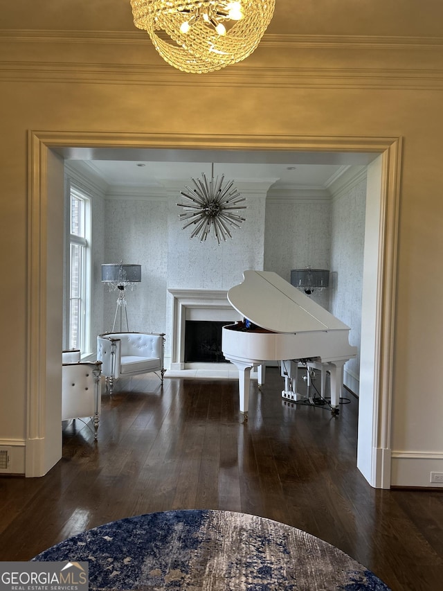 3084 Watsons Bnd, Milton, GA 30004 - hall featuring a chandelier, wood finished floors, crown molding, and wallpapered walls