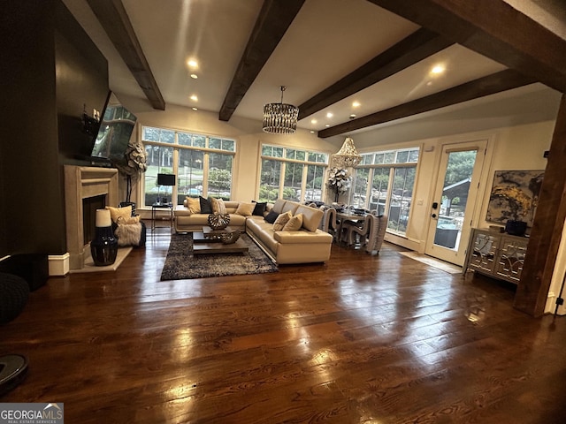 3084 Watsons Bnd, Milton, GA 30004 - living room with beamed ceiling, a premium fireplace, hardwood / wood-style floors, a chandelier, and recessed lighting