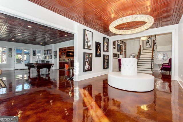 3084 Watsons Bnd, Milton, GA 30004 - corridor with an ornate ceiling, finished concrete floors, and stairway