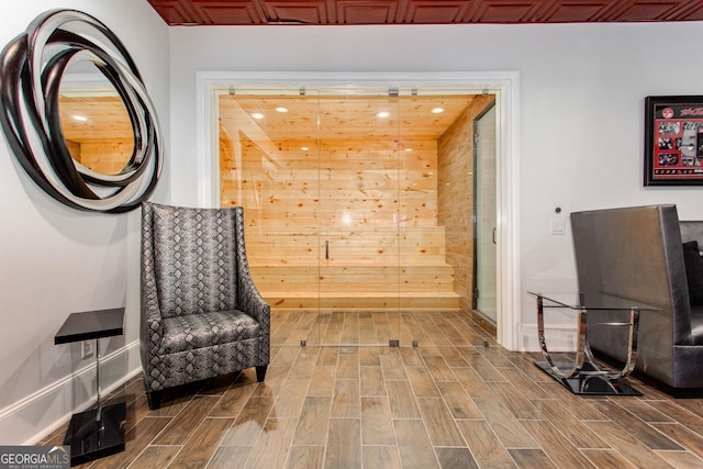 3084 Watsons Bnd, Milton, GA 30004 - sitting room with wood finished floors, recessed lighting, and wooden walls