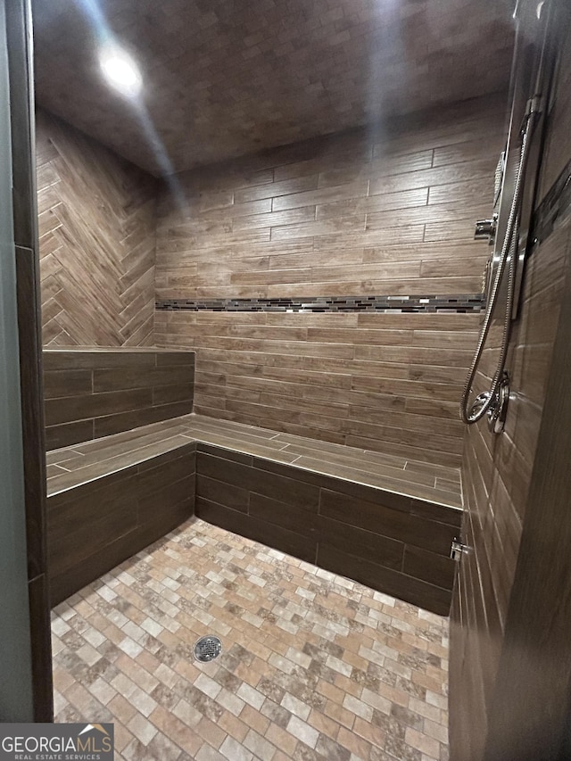 3084 Watsons Bnd, Milton, GA 30004 - full bathroom with a tile shower and brick patterned flooring