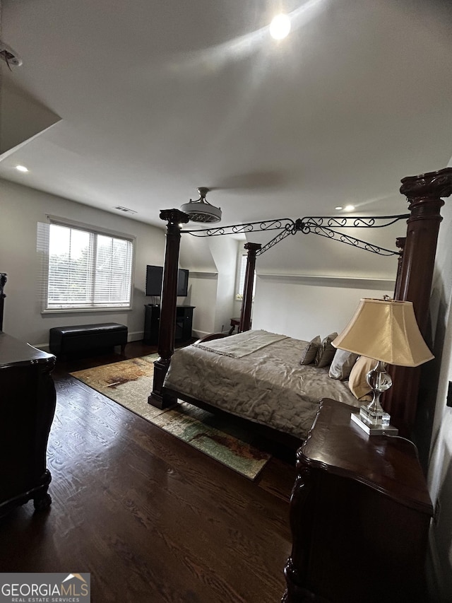 3084 Watsons Bnd, Milton, GA 30004 - bedroom with wood finished floors and a wood stove