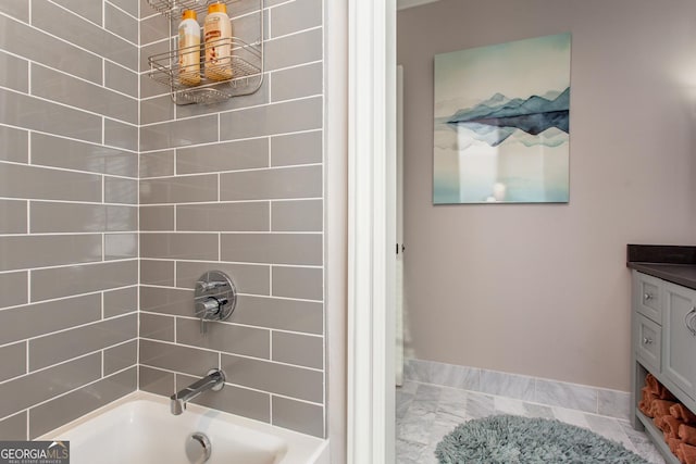 3084 Watsons Bnd, Milton, GA 30004 - bathroom featuring shower / bath combination, vanity, and marble look tiles