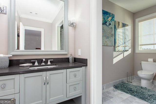 3084 Watsons Bnd, Milton, GA 30004 - bathroom featuring vanity, marble look tile flooring, and crown molding