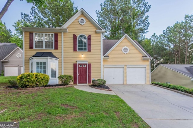 7113 Ambercrest Ct, Austell, GA 30168 - traditional-style house featuring concrete driveway, a garage, and a front yard