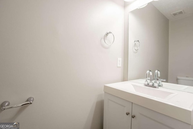 7113 Ambercrest Ct, Austell, GA 30168 - bathroom featuring vanity and toilet