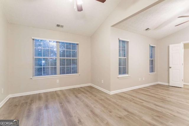 7113 Ambercrest Ct, Austell, GA 30168 - unfurnished room with a ceiling fan, lofted ceiling, and wood finished floors